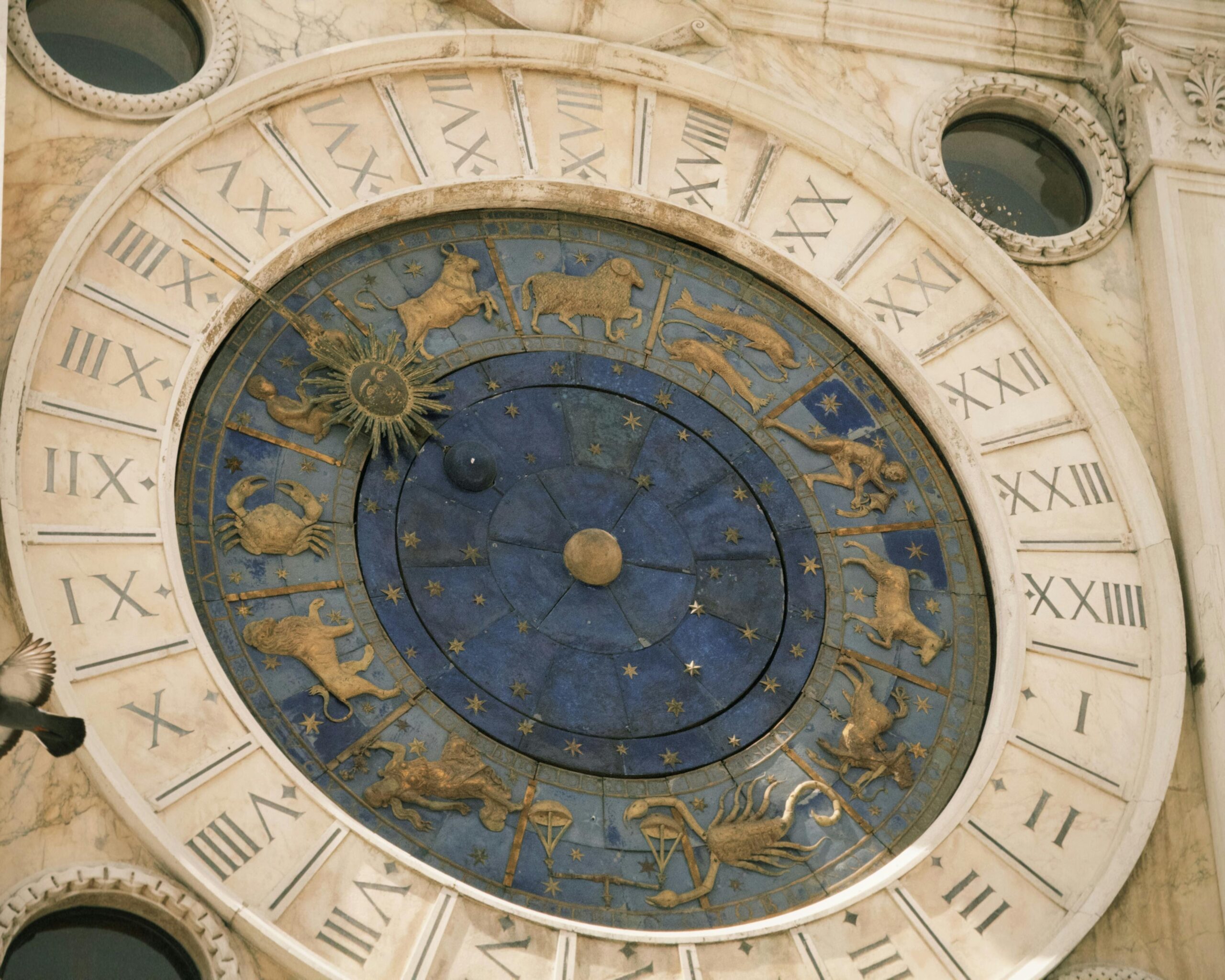Stunning close-up of the historic astrological clock in Venice showcasing zodiac symbols.